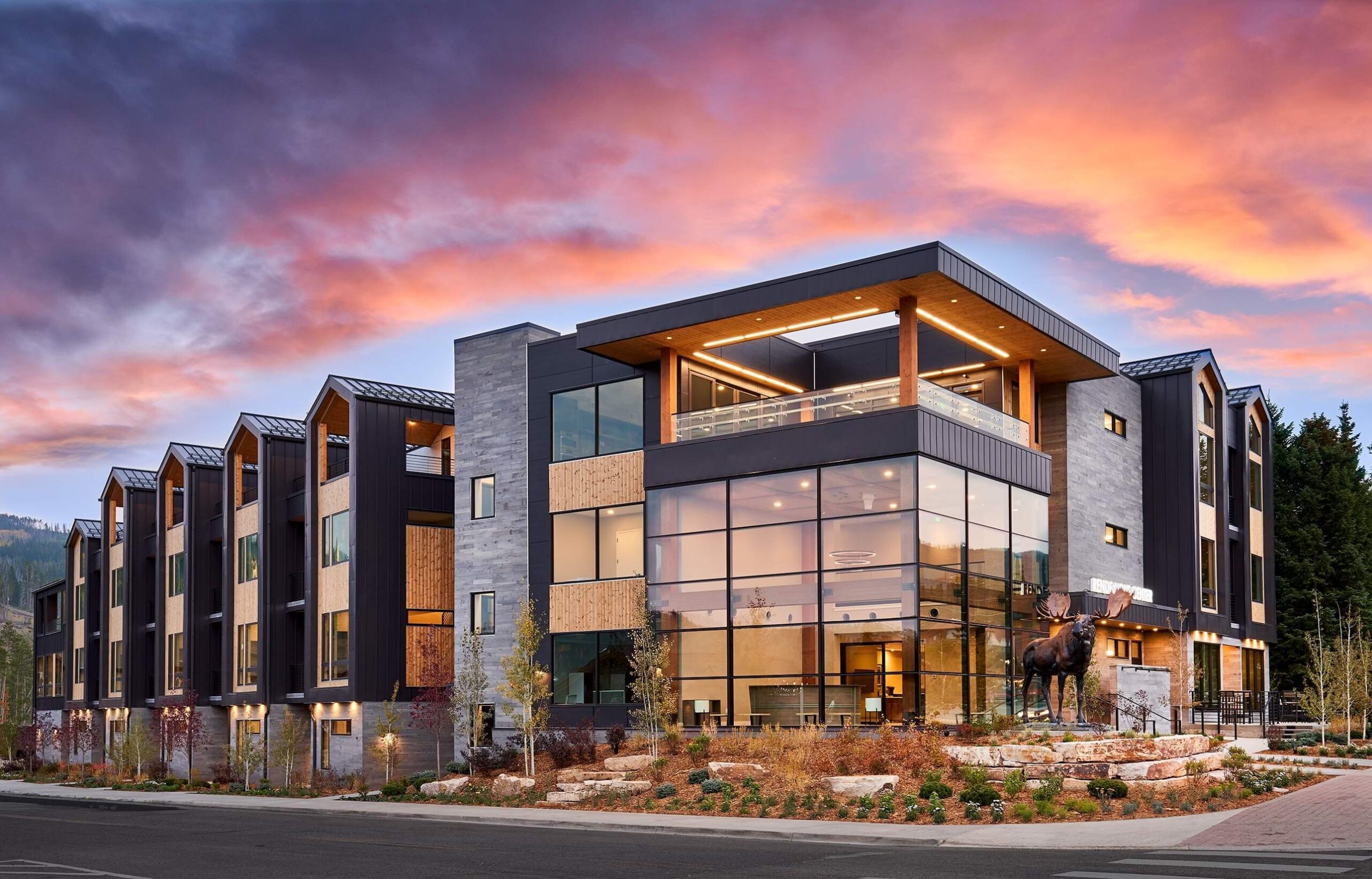 Building exterior with pink clouds